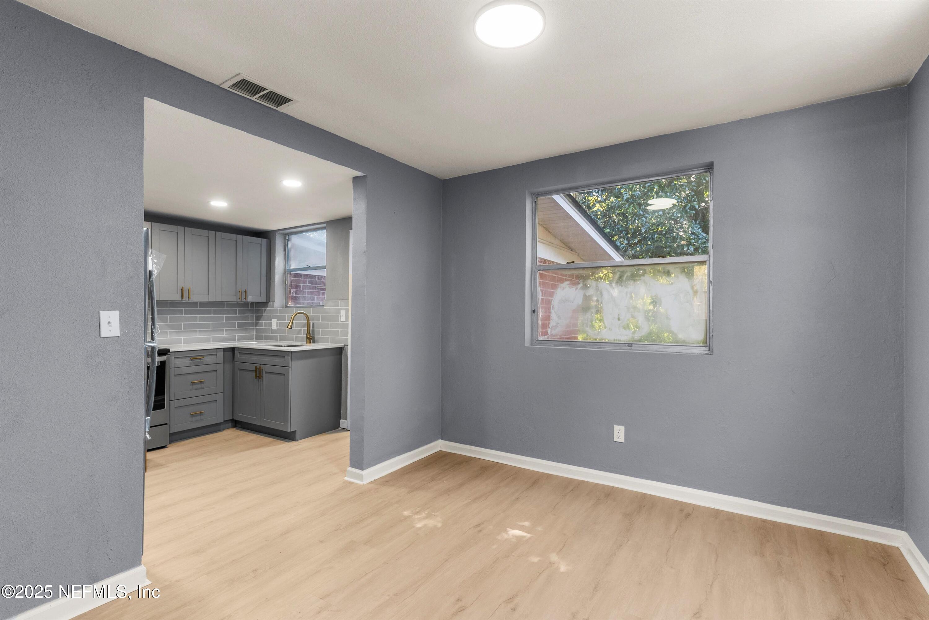 3150 Belden Circle Jacksonville, FL 32207 - Photo 45 of 69 a view of a kitchen with a sink and a window