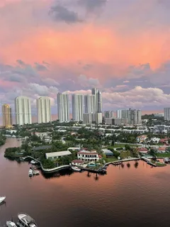 a view of a lake with a city