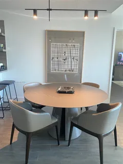 a view of a dining room with furniture