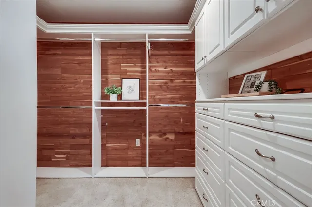 a bathroom with a tub sink shower and mirror
