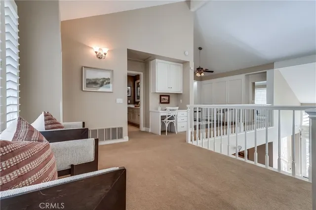a bedroom with furniture and a chandelier