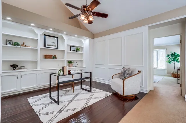 a livingroom with furniture and window