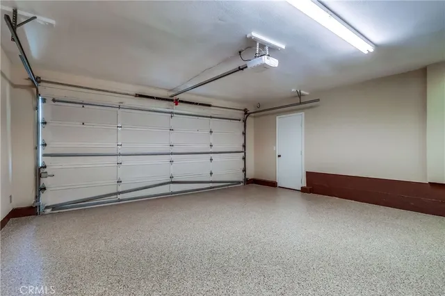 a view of a big room with windows