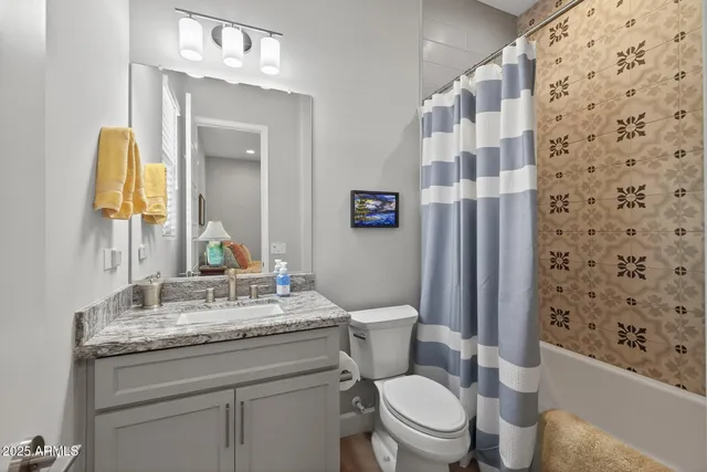 a view of swimming pool with outdoor seating and plants