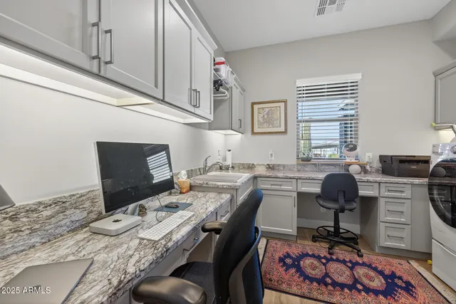 a swimming pool with outdoor seating and yard