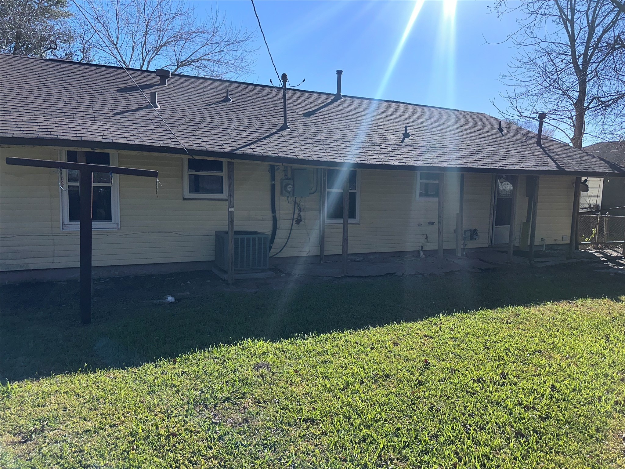 5715 Beldart Street Houston, TX 77033 - Photo 12 of 12 a front view of a house with a yard
