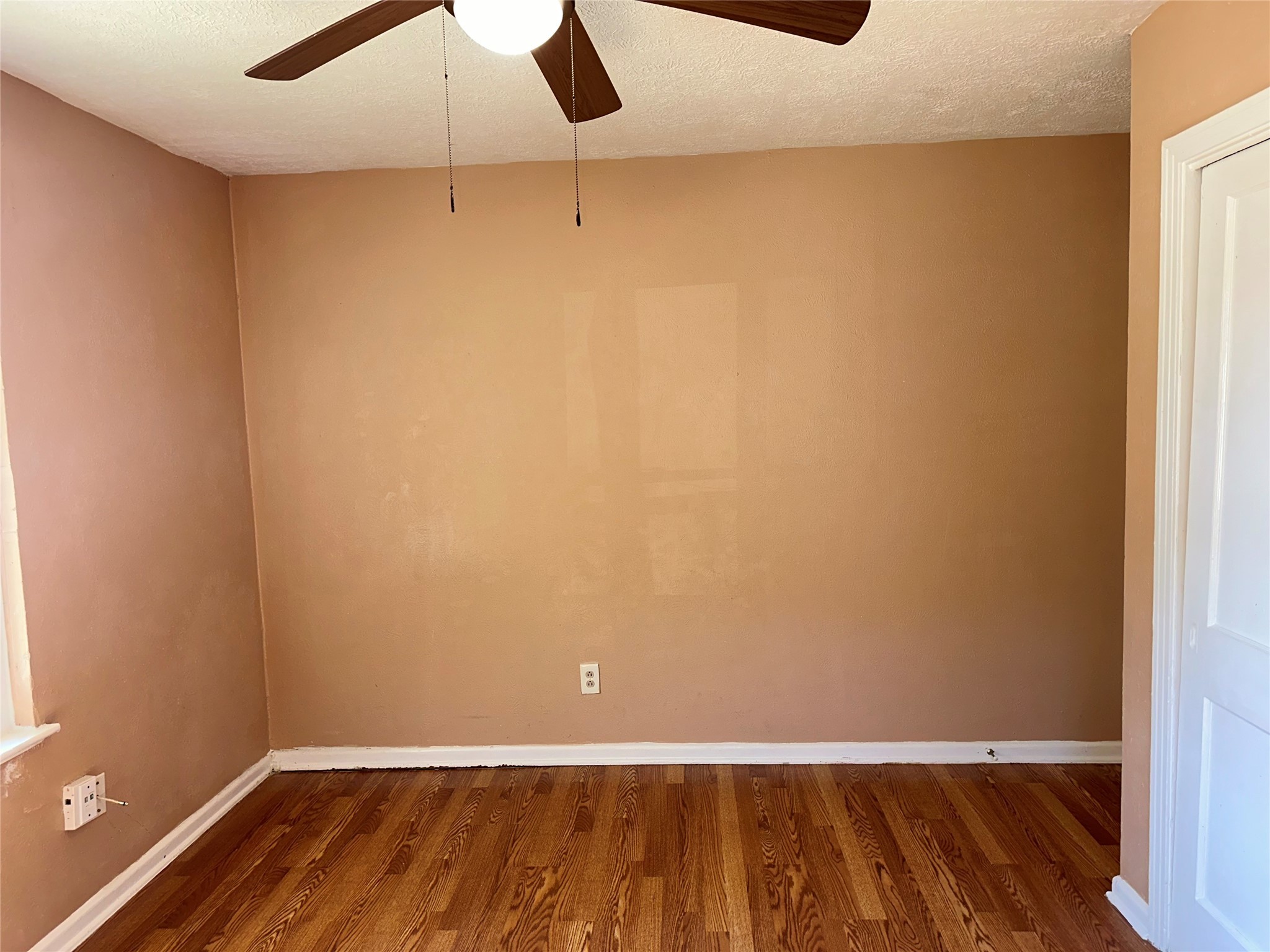 5715 Beldart Street Houston, TX 77033 - Photo 8 of 12 a view of an empty room