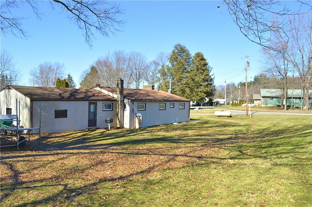 913 Hillside Road Jamestown, PA 16134 - Photo 2 of 3 Back Yard - Double lot is 0.44 acre total. Propane gas grill is ready to go and feeds off the main tank, so no separate propane tank needed!
