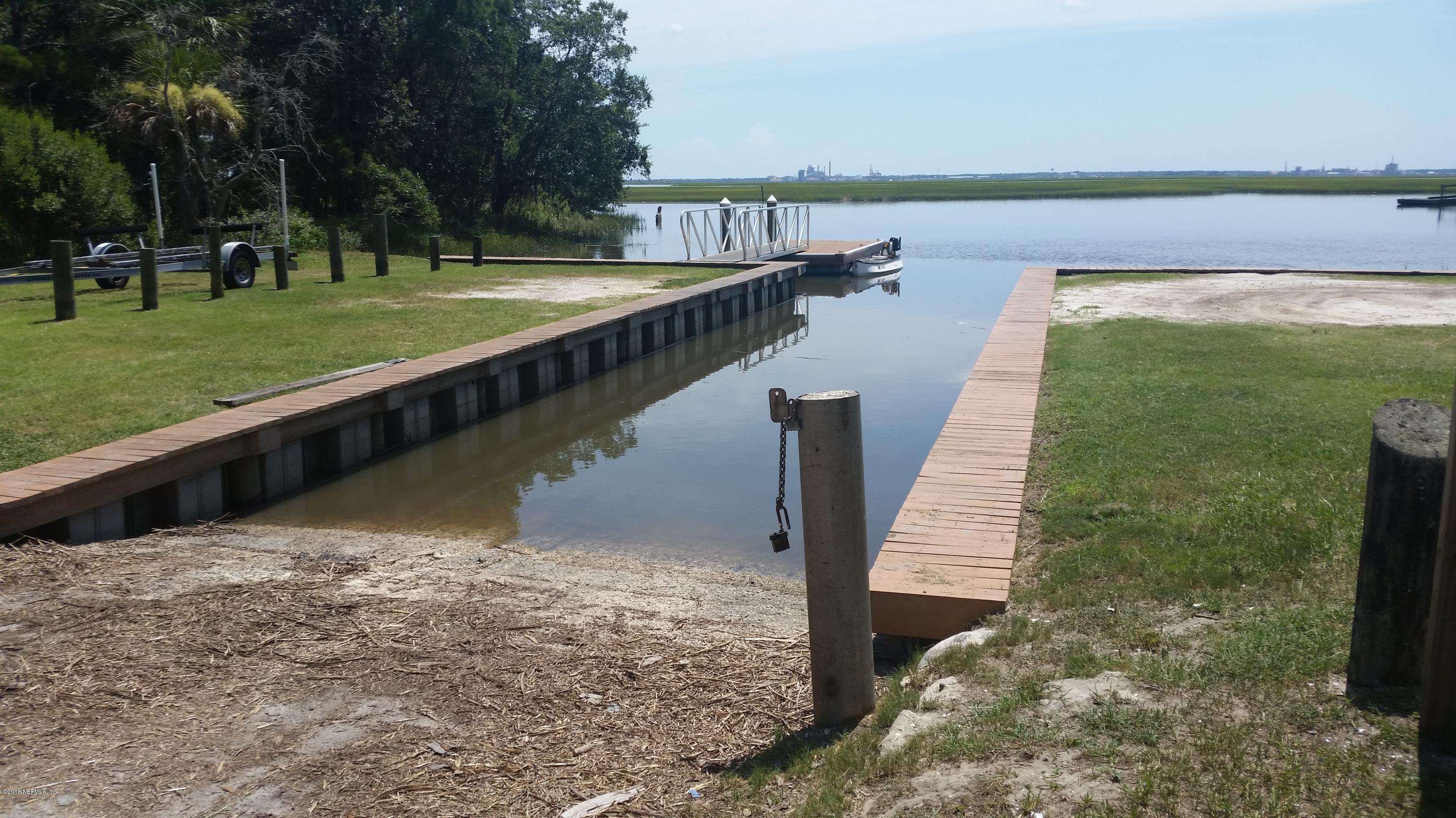 Lot 28 Pirates Point Road Yulee, FL 32097 - Photo 10 of 13 a view of a yard with large trees