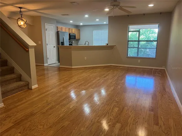a view of kitchen and wooden floor