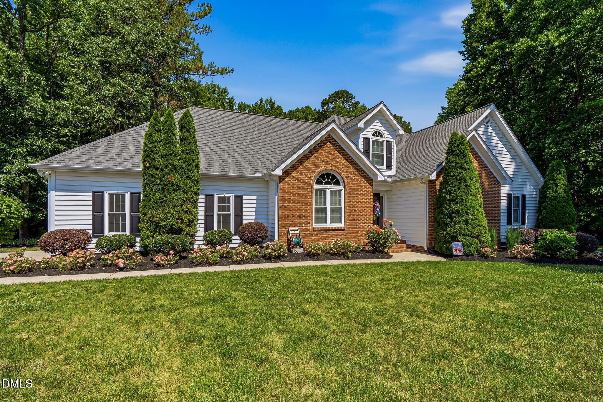 1112 Tyler Farms Drive Raleigh, NC 27603 - Photo 4 of 78 a front view of a house with a yard