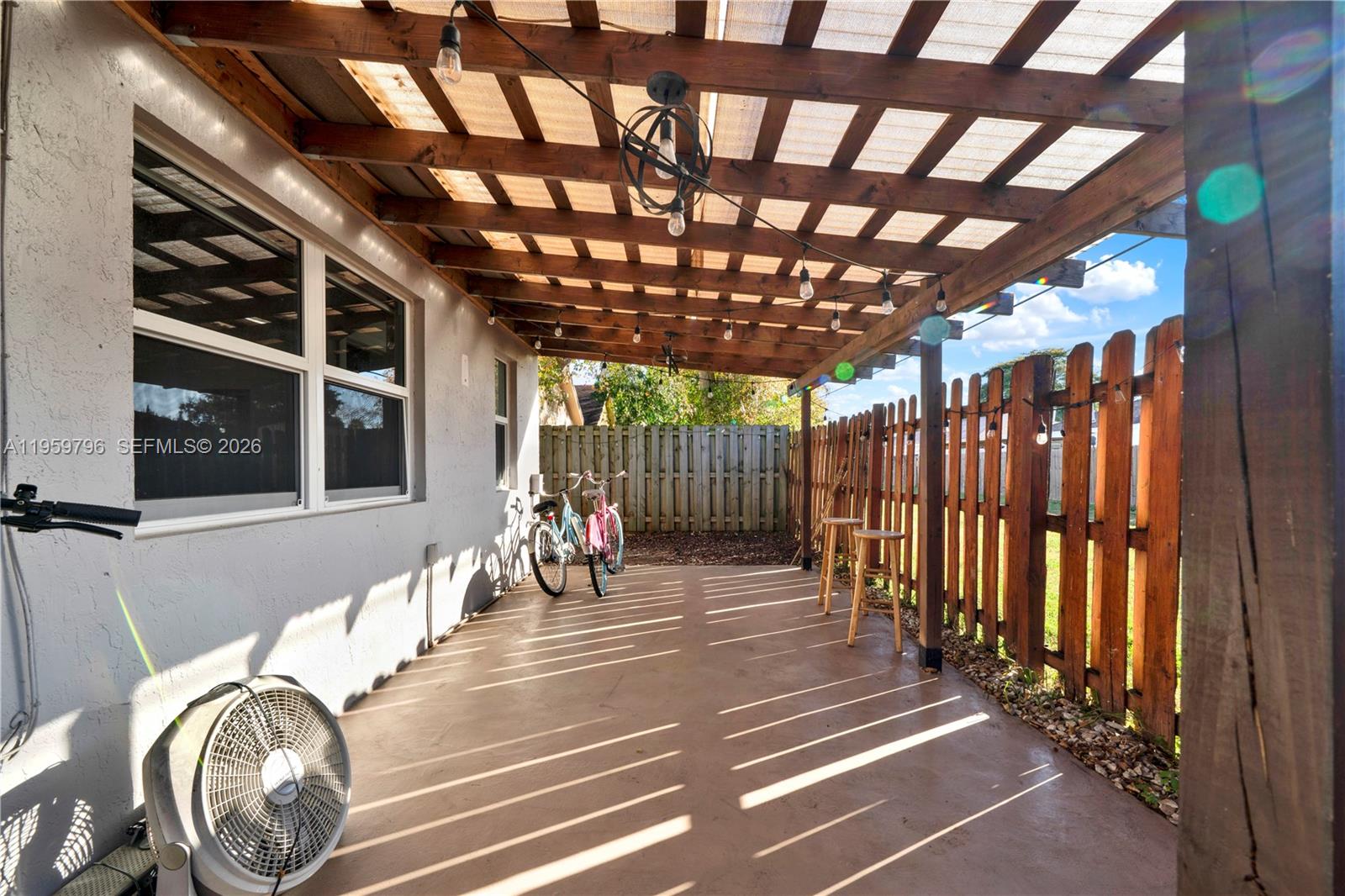 14600 Southwest 124th Place Miami, FL 33186 - Photo 22 of 34 a view of a porch with wooden floor