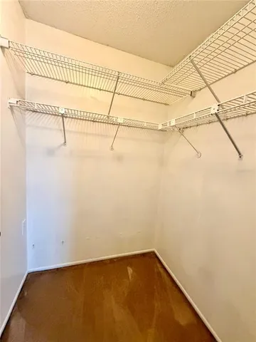 a view of a room with racks on the wall