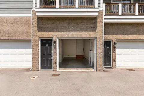 an aerial view of a house with a ocean view