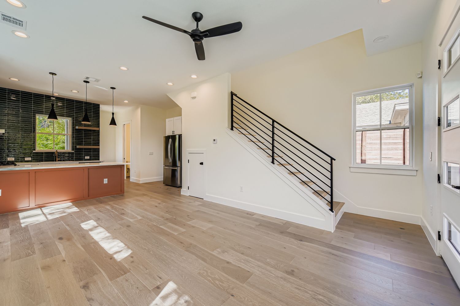4712 South Forest Drive Austin, TX 78745 - Photo 8 of 27 a view of kitchen and hall with wooden floor