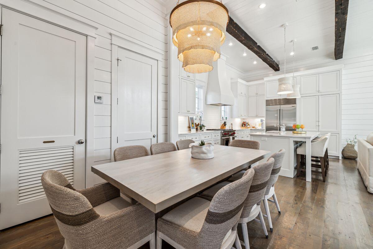 9 Honor Ln Inlet Beach Inlet Beach, FL 32461 - Photo 12 of 55 a view of a dining room with furniture window and wooden floor