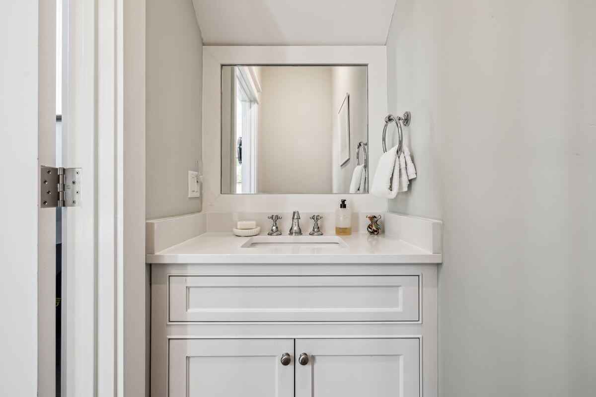 9 Honor Ln Inlet Beach Inlet Beach, FL 32461 - Photo 19 of 55 a bathroom with a sink and a mirror