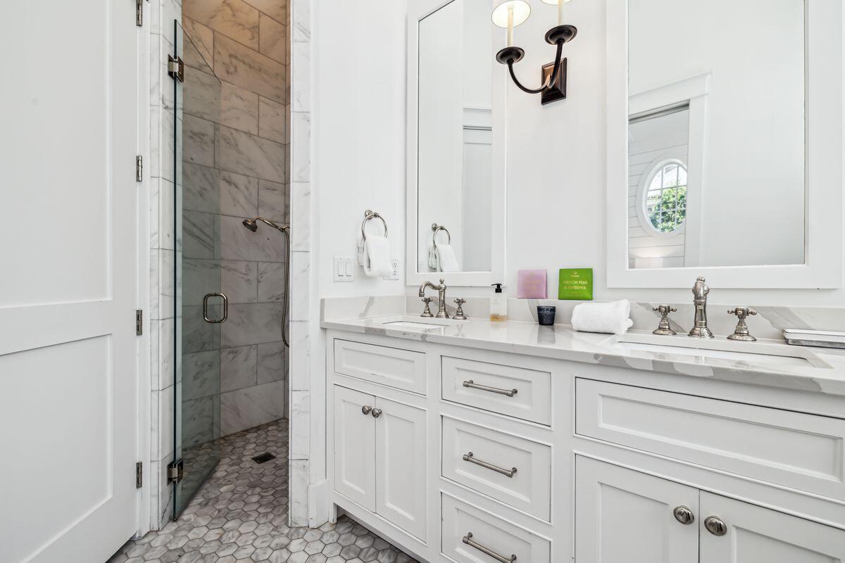 9 Honor Ln Inlet Beach Inlet Beach, FL 32461 - Photo 22 of 55 a bathroom with a granite countertop sink mirror and vanity