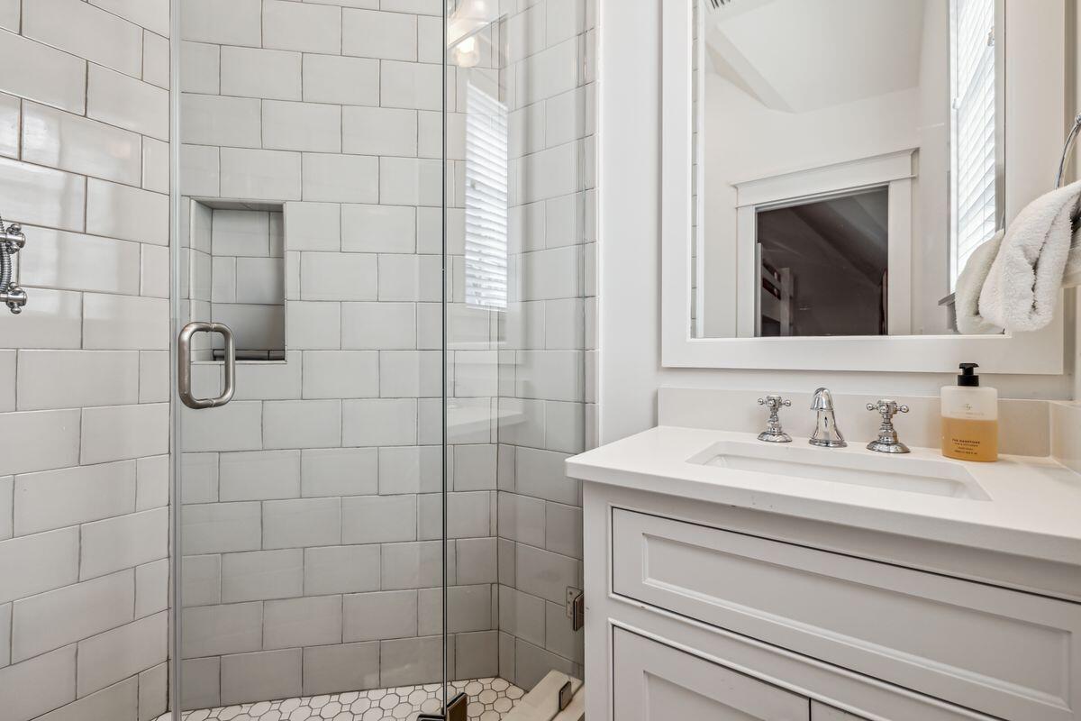 9 Honor Ln Inlet Beach Inlet Beach, FL 32461 - Photo 26 of 55 a bathroom with a sink and a mirror