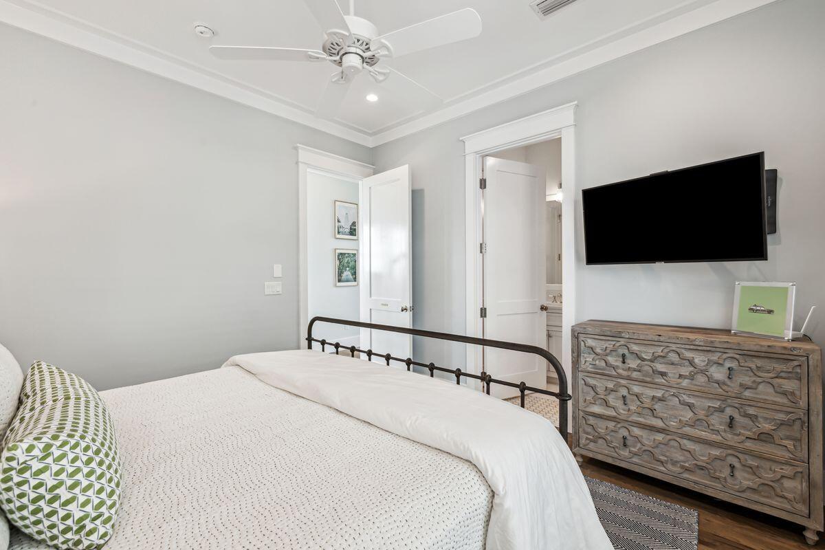 9 Honor Ln Inlet Beach Inlet Beach, FL 32461 - Photo 28 of 55 a bedroom with a bed and a flat screen tv