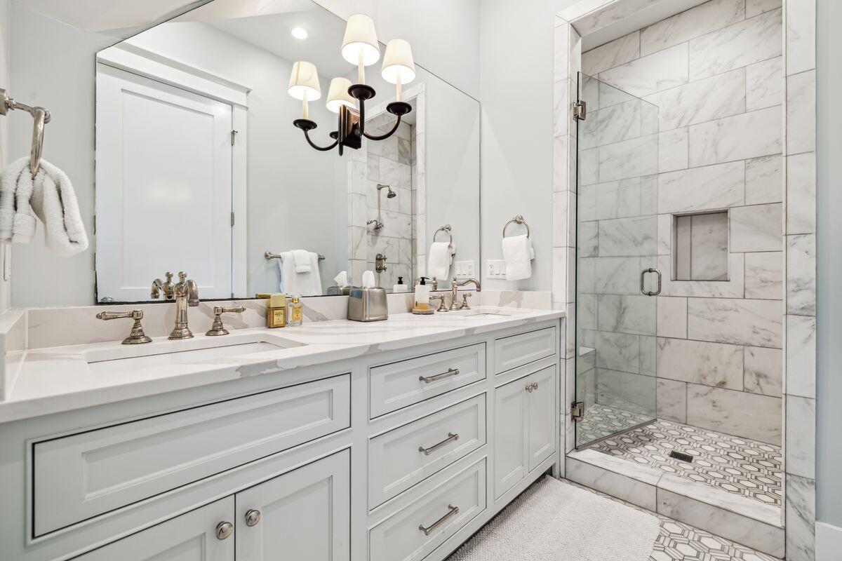9 Honor Ln Inlet Beach Inlet Beach, FL 32461 - Photo 38 of 55 a bathroom with a double vanity sink mirror and shower