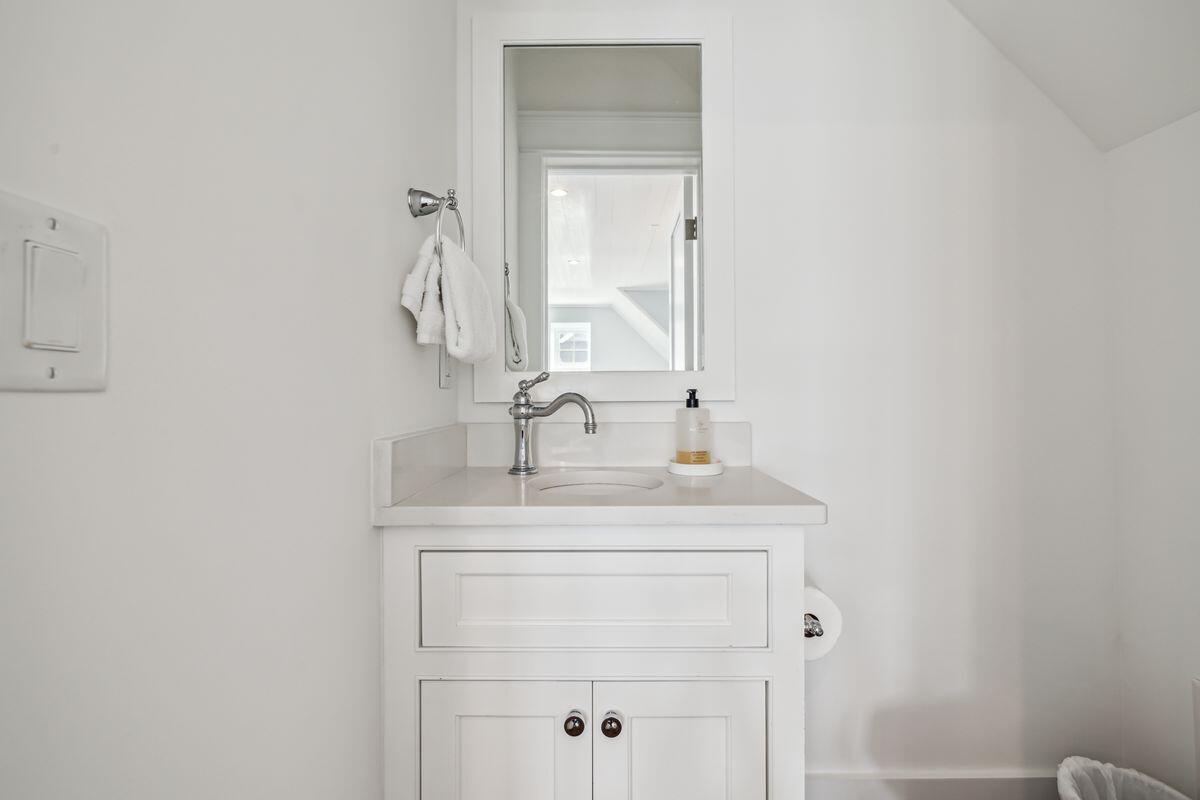 9 Honor Ln Inlet Beach Inlet Beach, FL 32461 - Photo 40 of 55 a bathroom with a sink and a mirror