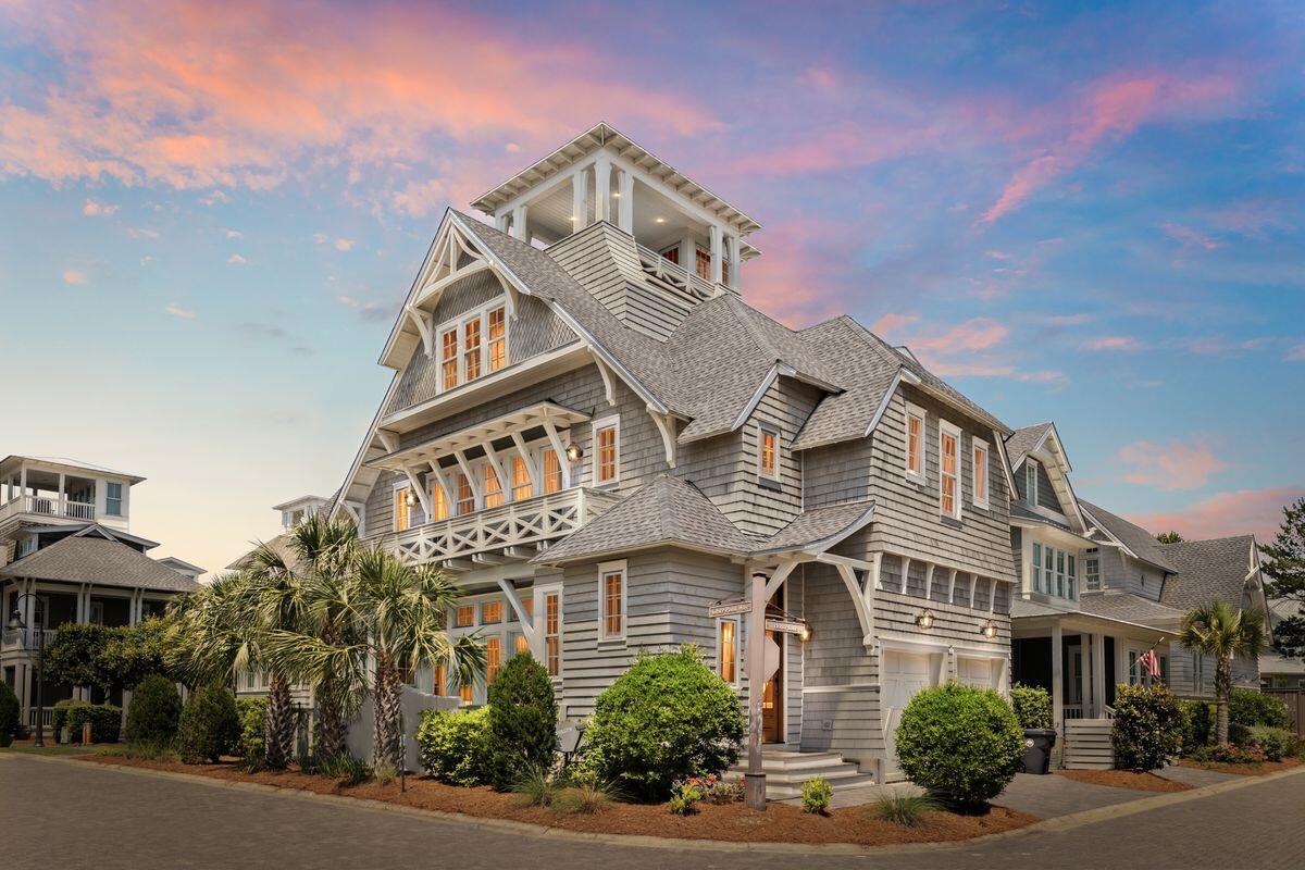 9 Honor Ln Inlet Beach Inlet Beach, FL 32461 - Photo 50 of 55 a front view of a residential apartment building with a yard