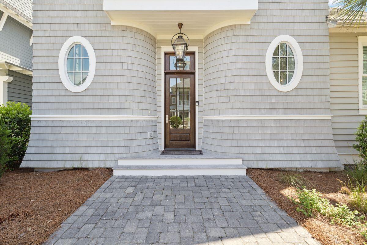 9 Honor Ln Inlet Beach Inlet Beach, FL 32461 - Photo 52 of 55 a front view of a house with a garden