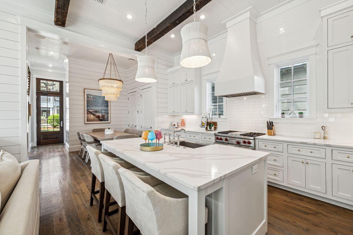 9 Honor Ln Inlet Beach Inlet Beach, FL 32461 - Photo 6 of 55 a kitchen that has a table and chairs in it