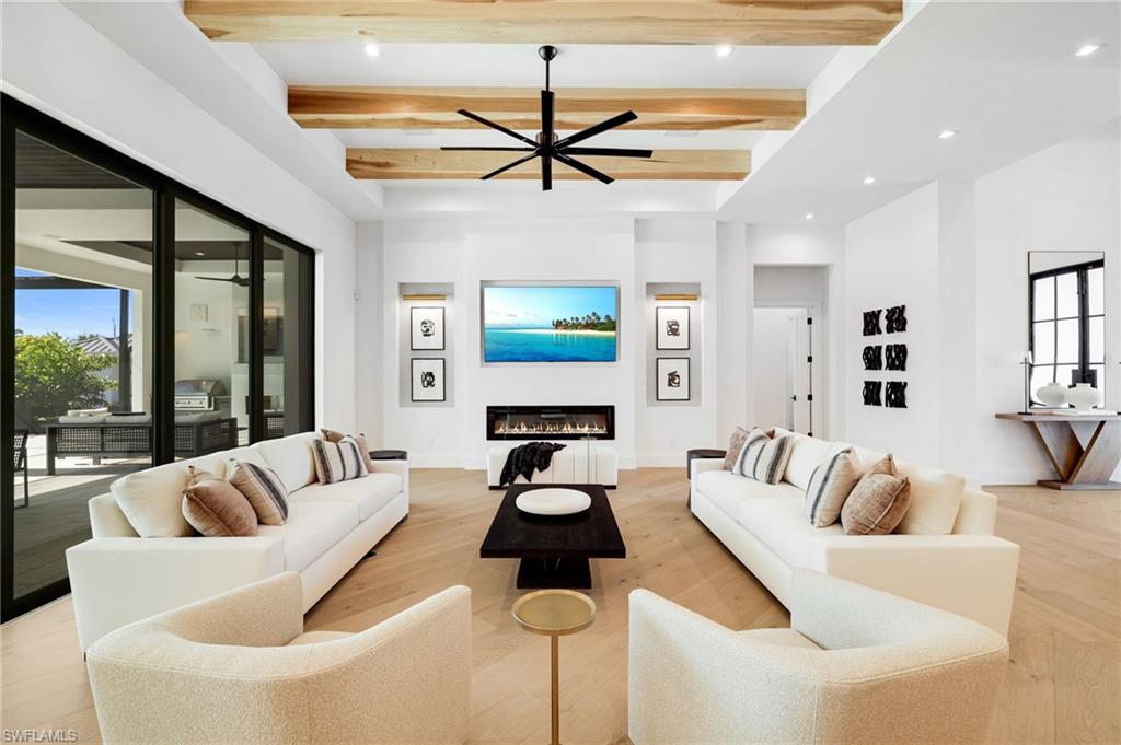 15850 Hampton View Fort Myers, FL 33908 - Photo 14 of 38 Bedroom with a chandelier and light wood-style floors