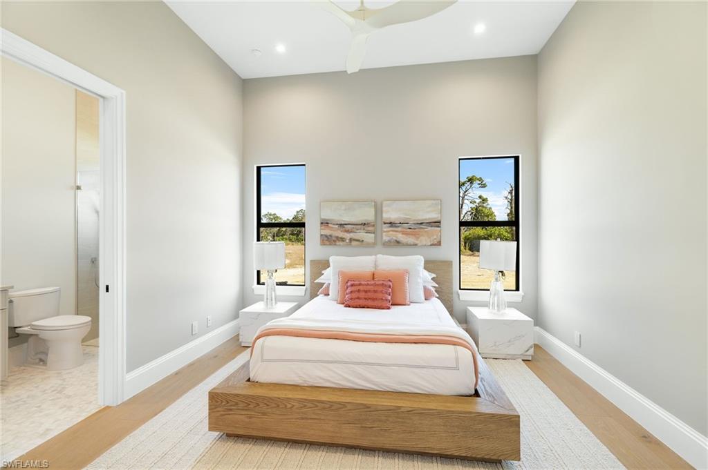 15850 Hampton View Fort Myers, FL 33908 - Photo 21 of 38 Bedroom featuring light wood-type flooring and a ceiling fan