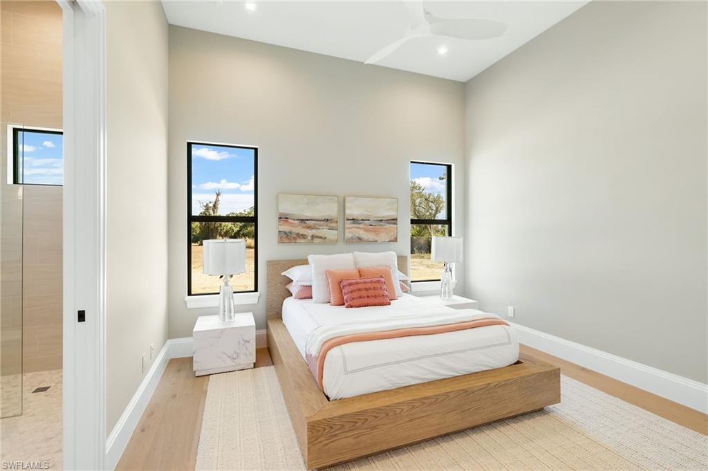 15850 Hampton View Fort Myers, FL 33908 - Photo 22 of 38 Full bathroom featuring a walk in shower and vanity