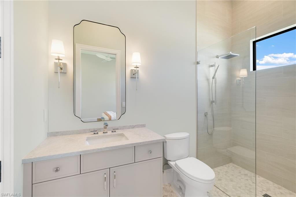 15850 Hampton View Fort Myers, FL 33908 - Photo 23 of 38 Bathroom with vanity and walk in shower