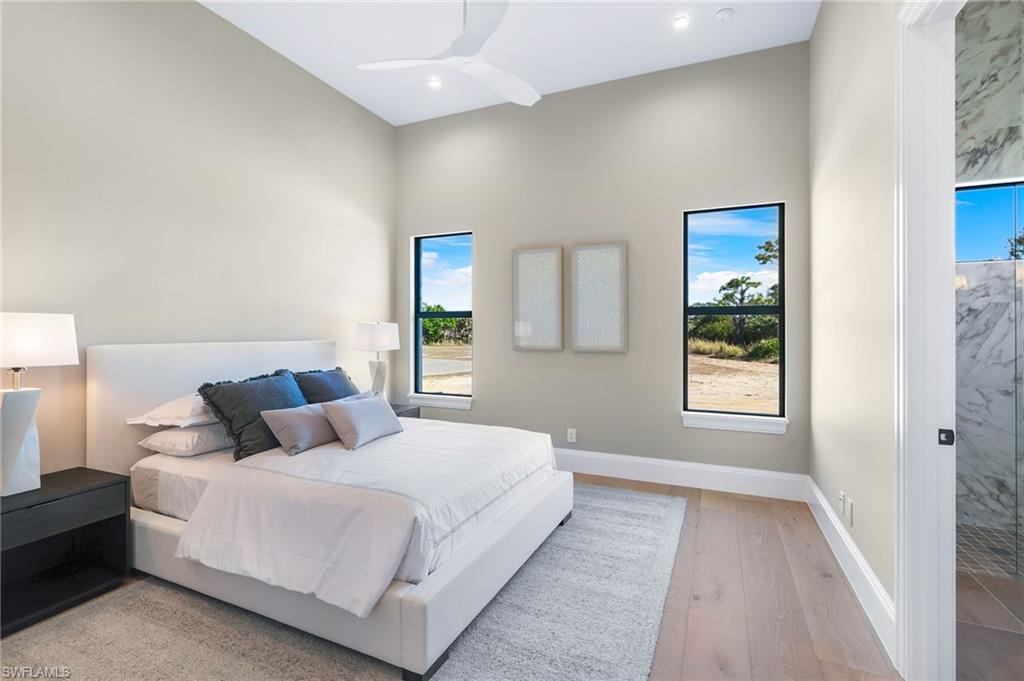 15850 Hampton View Fort Myers, FL 33908 - Photo 24 of 38 Bedroom featuring light wood-style floors and ceiling fan