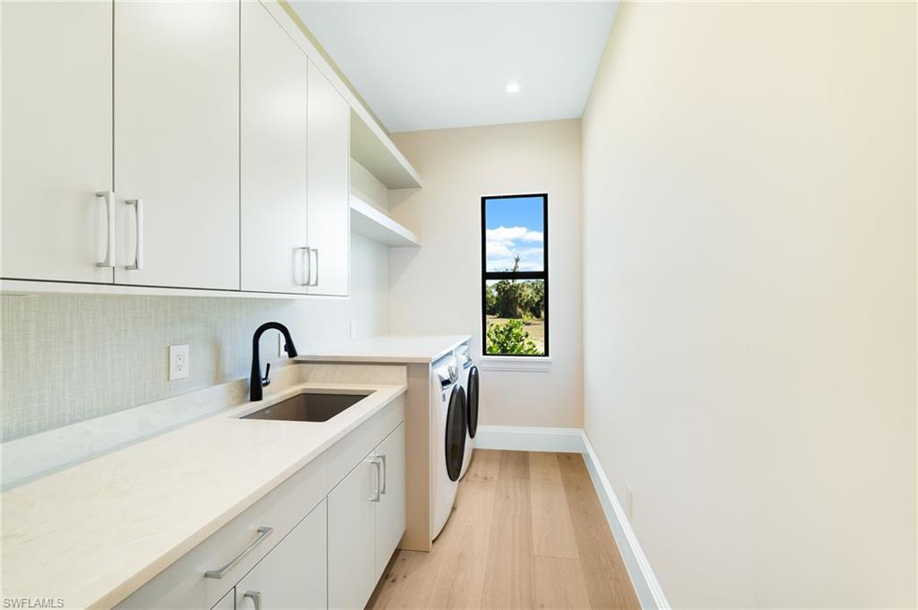15850 Hampton View Fort Myers, FL 33908 - Photo 29 of 38 Integrated pool / hot tub featuring a sunroom, a lanai, and a patio area