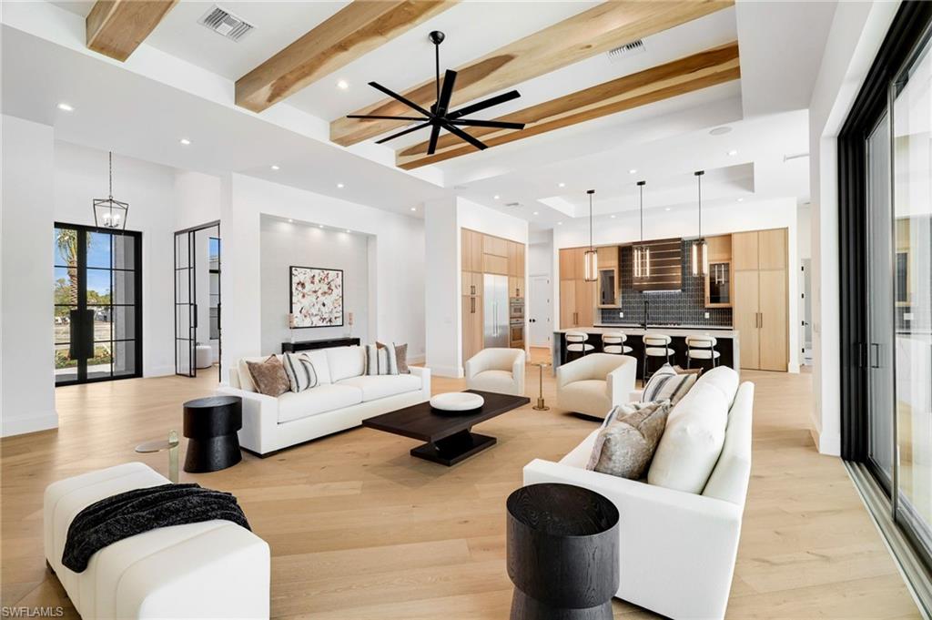 15850 Hampton View Fort Myers, FL 33908 - Photo 9 of 38 Living area featuring recessed lighting, light wood-type flooring, a ceiling fan, and french doors