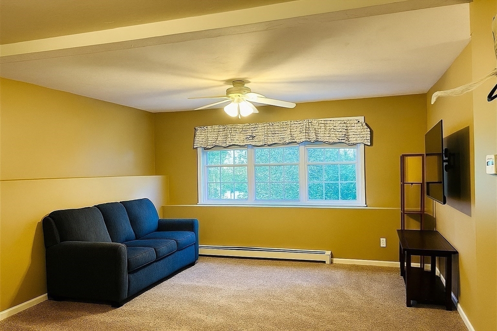 53 Denver Terrace Worcester, MA 01604 - Photo 12 of 19 a living room with furniture and a window