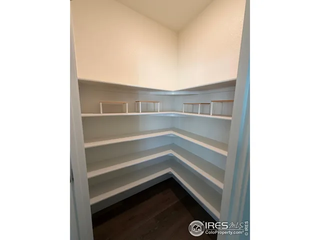 a close up of a utility room with washing machine