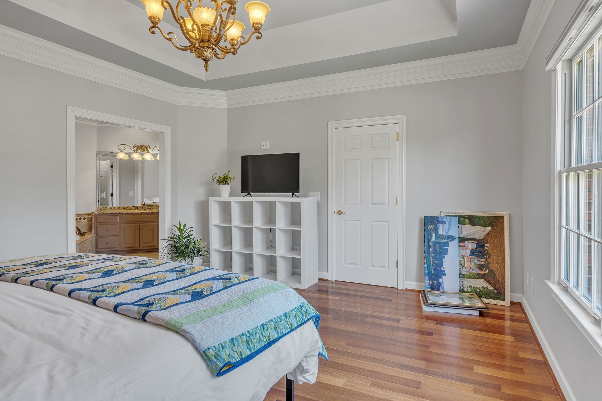 1651 Lawrence Lane Springfield, TN 37172 - Photo 27 of 56 a bedroom with a bed and a flat tv screen on dresser