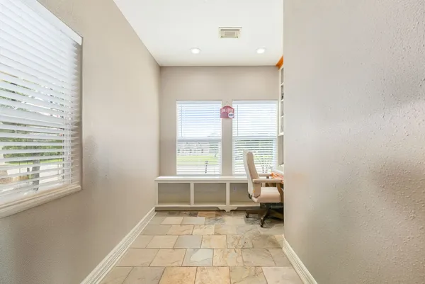 a very nice looking room with a large window