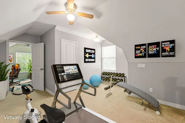 a bedroom with furniture and a chandelier