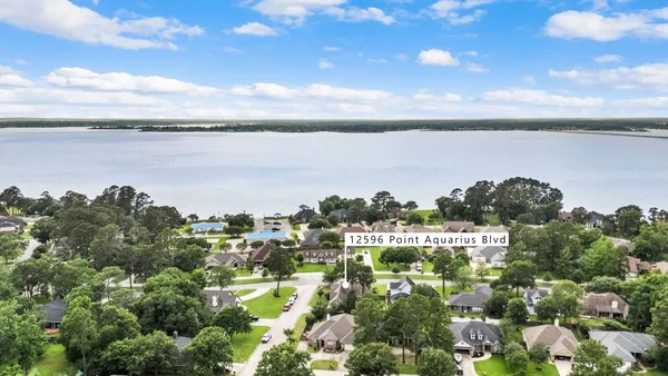 a view of a lake with a city