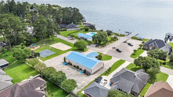 an aerial view of house with a yard