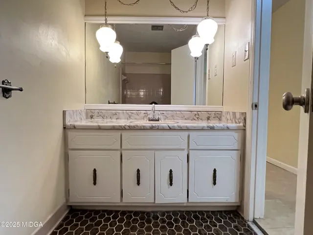 a bathroom with a bathtub and toilet