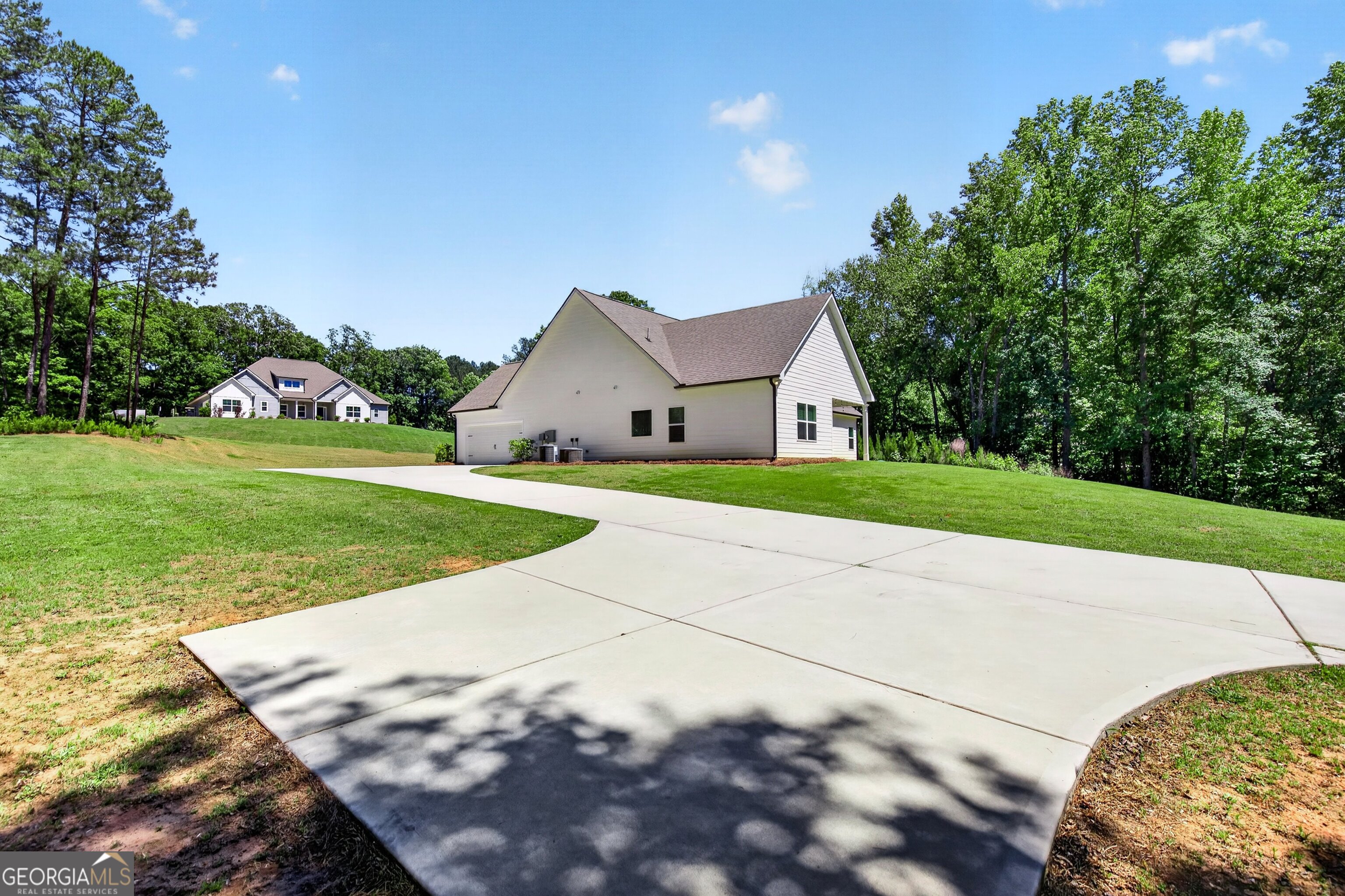 1764 Luther Bailey Road Senoia, GA 30276 - Photo 43 of 63 a view of a house with a yard
