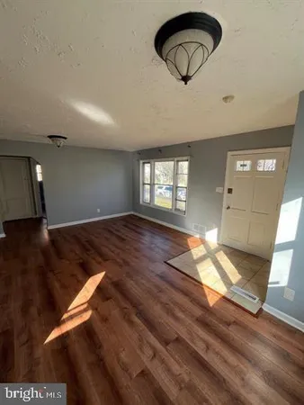 a view of an empty room and window