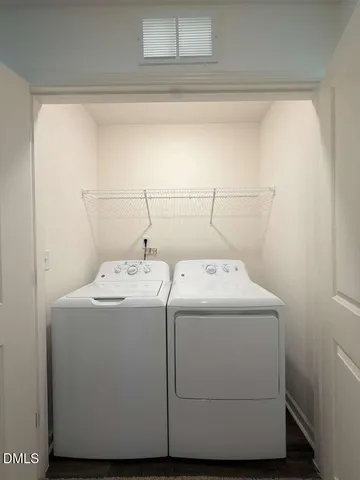 a view of a swimming pool with an outdoor space and seating area