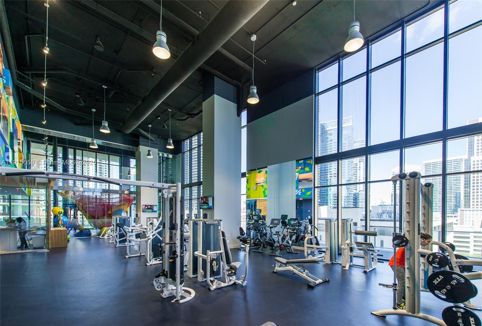 1010 Brickell Avenue, Unit 3002 Miami, FL 33131 - Photo 32 of 39 a view of a room with gym equipment