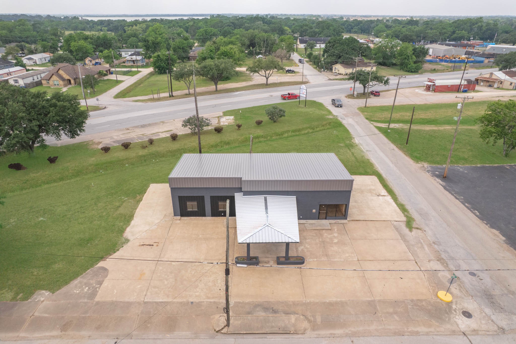 401 East Main Street Eagle Lake, TX 77434 - Photo 16 of 23 a aerial view of a house with a yard