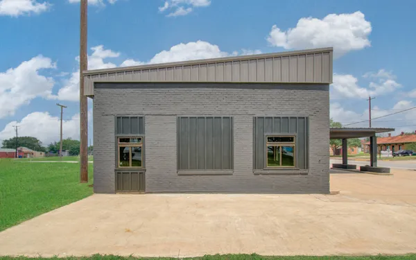 a view of a backyard with a garden